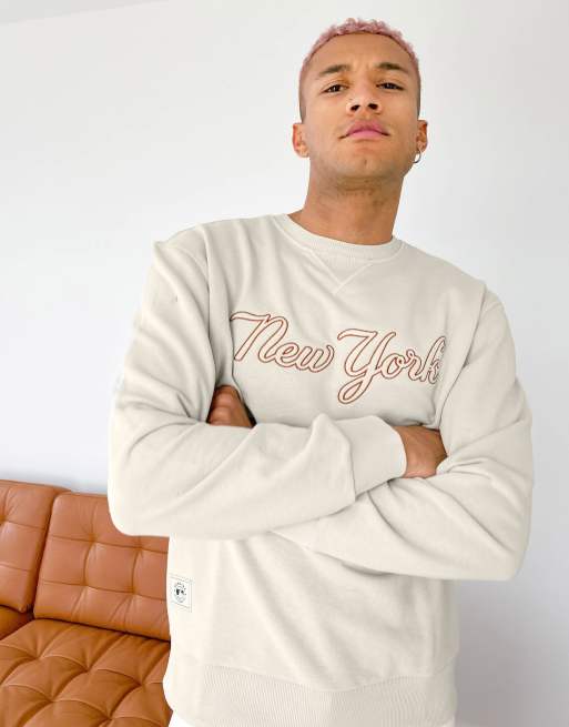 Sudadera beis con logo de texto de los New York Yankees de la MLB de New Era