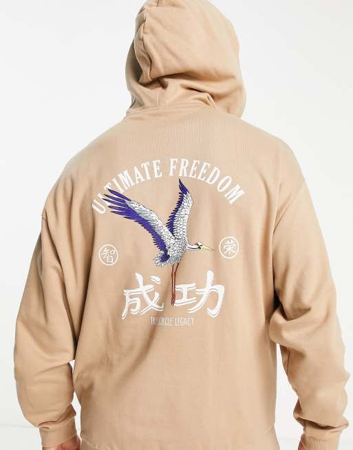 Sudadera beis extragrande con capucha y bordado de pájaro en la espalda de ASOS DESIGN