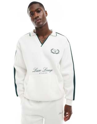 Sudadera beis extragrande con cuello tipo polo, estampado y ribetes de ASOS DESIGN