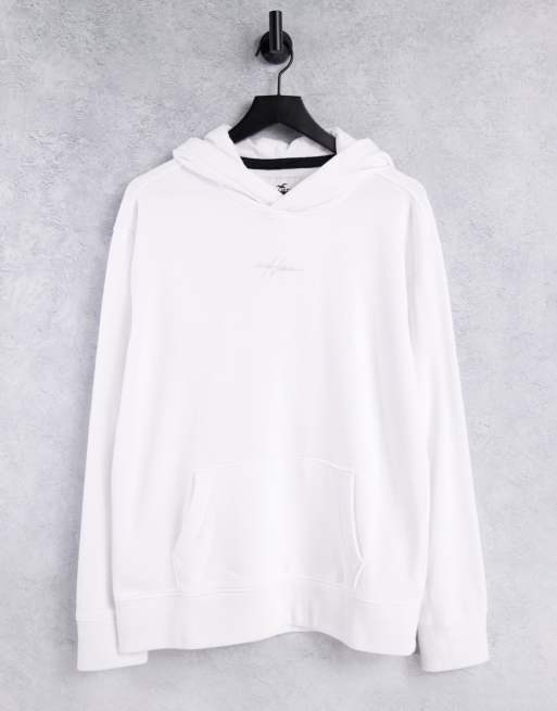 Sudadera blanca con capucha y logo de texto en la parte central de Hollister