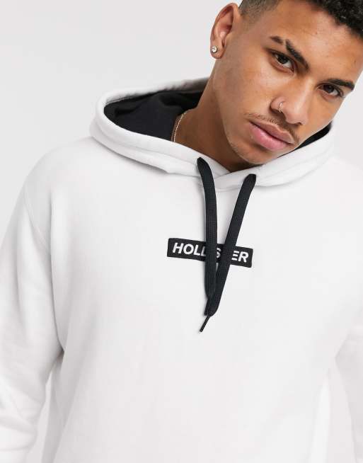 Sudadera blanca capucha y logo en recuadro de Hollister ASOS