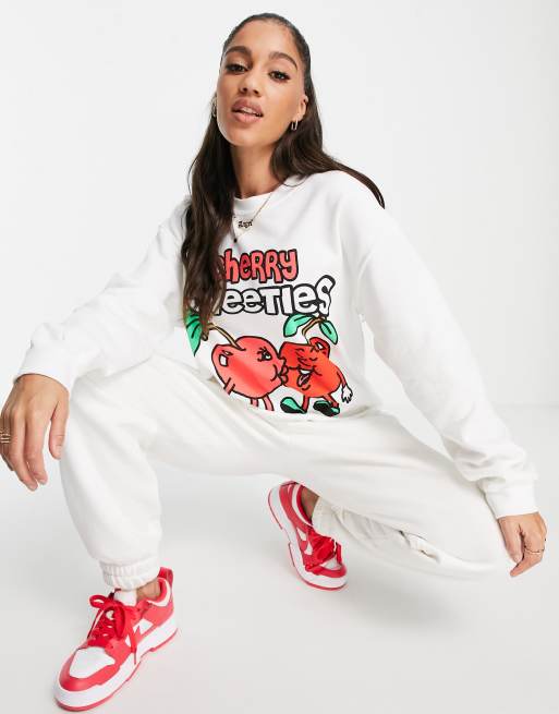 Sudadera blanca con estampado gráfico de cerezas de New Love Club