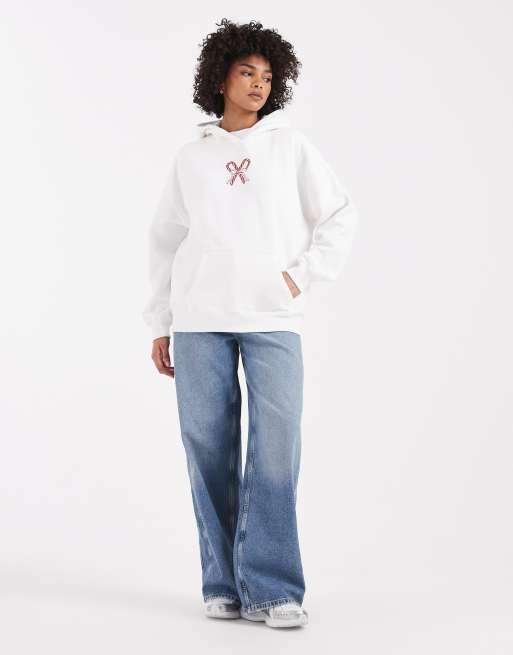 Sudadera blanca extragrande con capucha y estampado festivo "Nice List" de Hollister, 2 de 4
