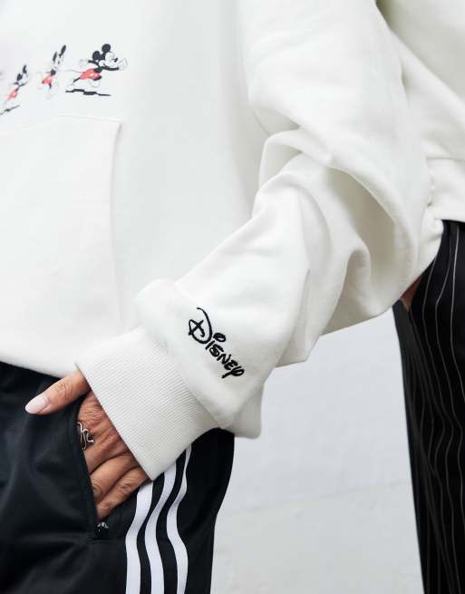 Sudadera blanca unisex extragrande con cuello tipo polo y estampado de Mickey Mouse de Disney de ASOS DESIGN, 2 de 4
