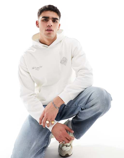 Sudadera blanco hueso con capucha Emblem de The Couture Club