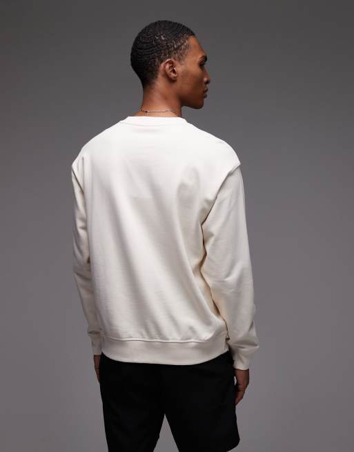 Sudadera blanco hueso con cuello redondo y logo premium Athletics de New Balance, 4 de 5