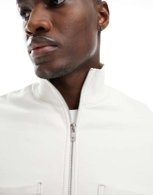 Sudadera blanco pálido extragrande con cuello alzado, cremallera corta y pespuntes en contraste de ASOS DESIGN, 2 de 4