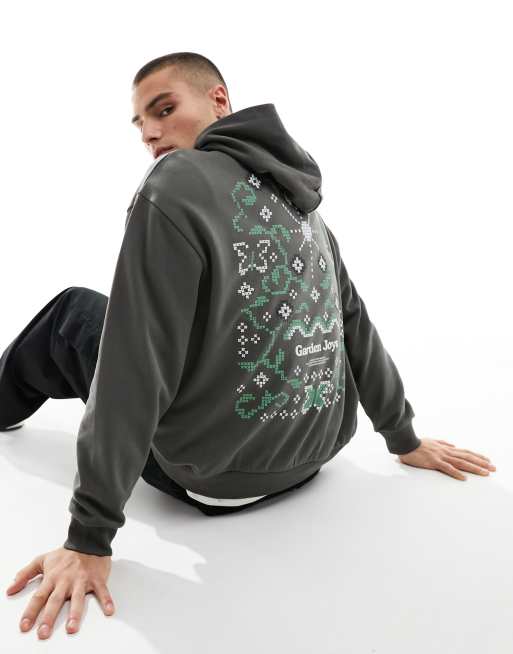 Sudadera caqui extragrande con capucha y estampado floral en la espalda de ASOS DESIGN