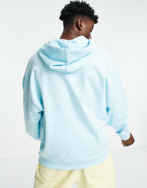 Sudadera color aqua unisex con capucha y logo arcoiris de Reclaimed Vintage Inspired