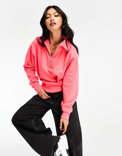 Sudadera color coral con logo y cremallera de Scalpers