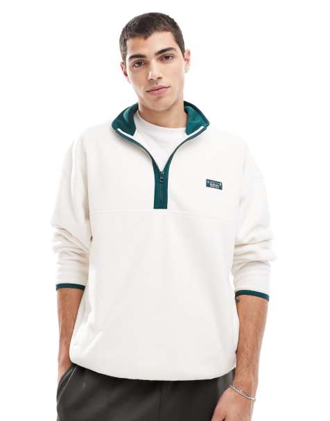 Sudadera color crema con media cremallera y detalle de motivo de Hollister - view 1