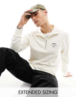 Sudadera color crema con media cremallera y logo de texto de GANT