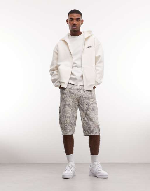 Sudadera color crema extragrande con capucha, cremallera y estampado gráfico de ASOS DESIGN, 2 de 5