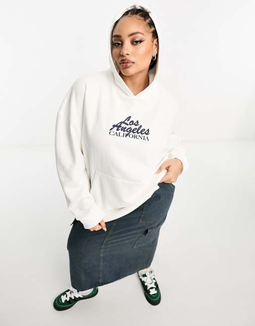 Sudadera color crema extragrande con capucha y gráfico Los Ángeles de ASOS DESIGN Curve