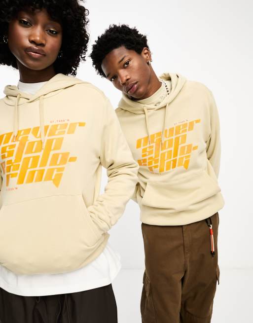Sudadera color piedra unisex con capucha y estampado gr fico en el