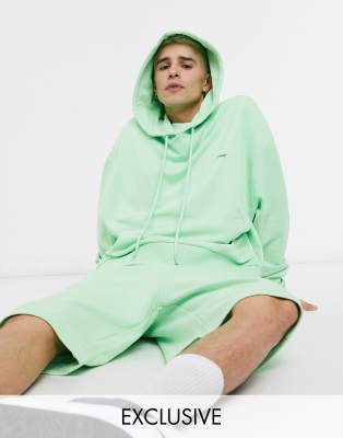 Sudadera con capucha corta extragrande en color verde de COLLUSION (parte de un conjunto)