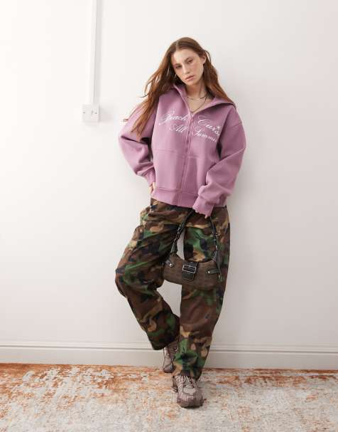 Sudadera con capucha, cremallera y estampado gráfico de COLLUSION - view 1