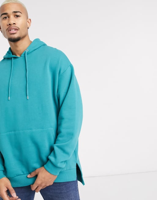 Sudadera con capucha extragrande en verde pizarra con bajo desigual de ASOS DESIGN
