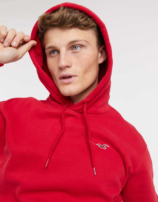 con capucha roja con logo de Hollister | ASOS