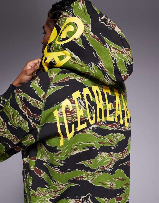 Sudadera con cremallera, estampado de camuflaje a rayas y gráfico de tigre sonriente de ICECREAM, 5 de 5