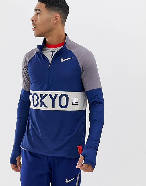 Depender de Ceniza matriz Sudadera con media cremallera en azul marino Tokyo de Nike Running | ASOS