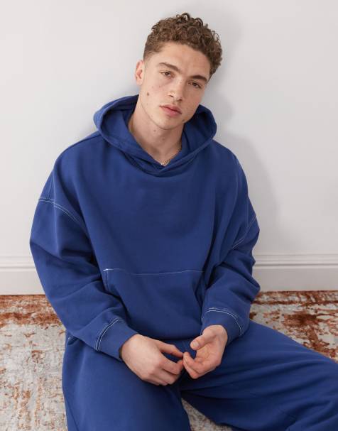 Sudadera corta azul marino de corte cuadrado con capucha, estampado y detalle de costuras de COLLUSION - view 1