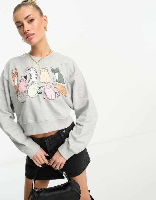 Sudadera corta gris jaspeado con estampado de gato de New Love Club