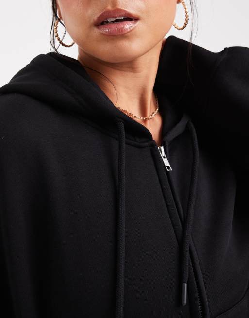 Sudadera corta negra con capucha, cremallera e interior afelpado de ASOS DESIGN, 2 de 4