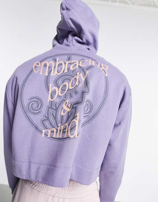 Sudadera corta violeta con capucha y estampado en la espalda de tejido grueso de ASOS DESIGN