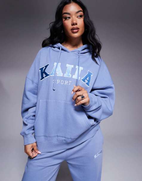 Sudadera deportiva azul claro con capucha y logo bordado de Kaiia (parte de un conjunto) - view 1