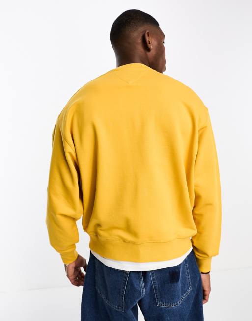 Sudadera dorada de corte cuadrado y cuello redondo con gráfico de Tommy Jeans, 2 de 4