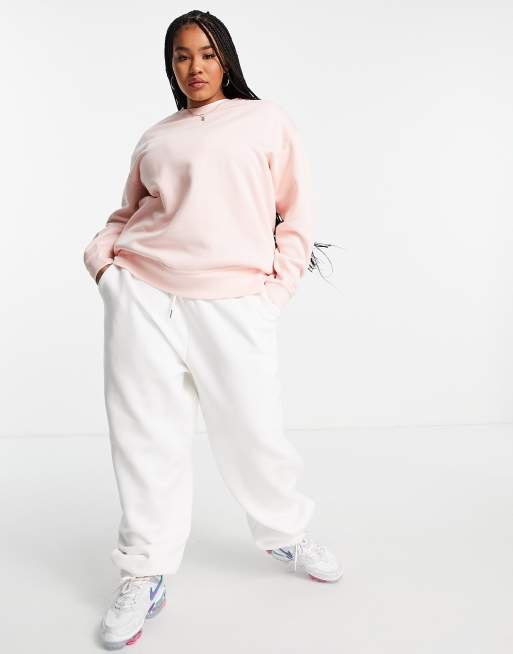 Sudadera extragrande color coral palido con logo pequeno de Nike Plus ASOS
