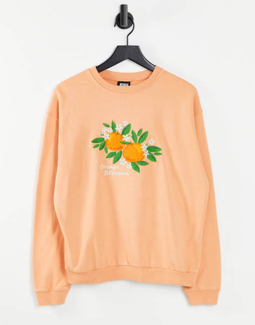Sudadera extragrande con estampado naranja de Minga London