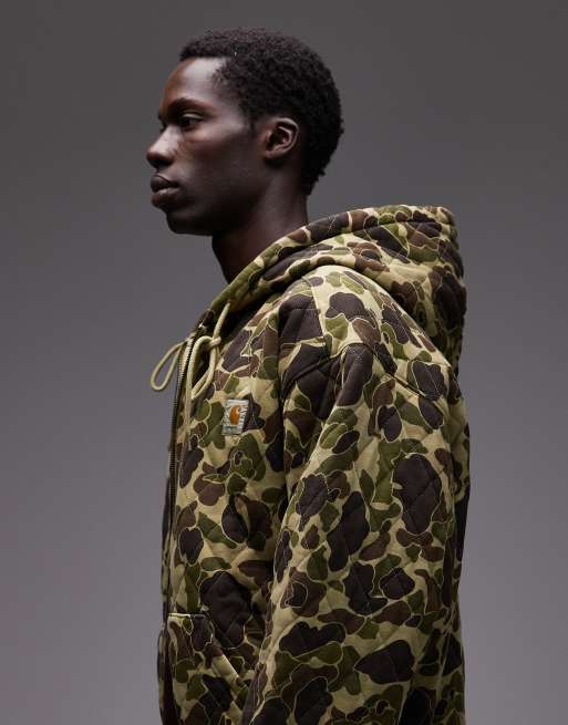 Sudadera extragrande guateada con capucha, estampado de camuflaje y cremallera Vista de Carhartt WIP, 4 de 5