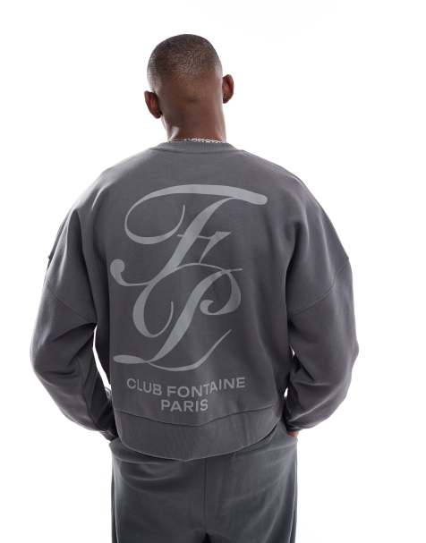 Sudadera gris carbón extragrande con hombros caídos y estampado en relieve de ASOS DESIGN - view 1