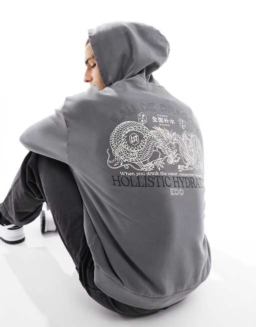 Sudadera gris carbón lavado extragrande con capucha y estampado de dragón en la espalda de ASOS DESIGN
