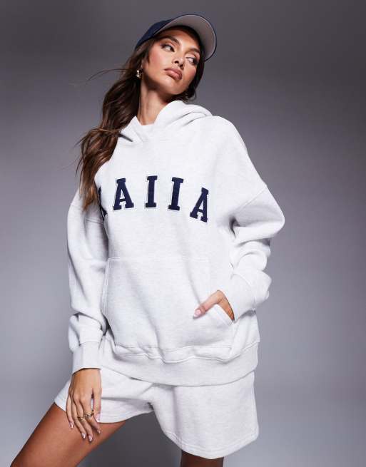 Sudadera gris claro jaspeado con capucha y logo bordado de Kaiia (parte de un conjunto)