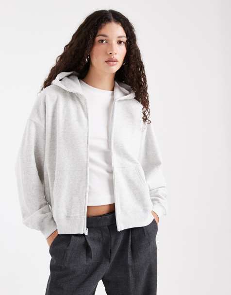Sudadera gris con capucha, cremallera, mangas murciélago y logo pequeño de Hollister - view 1