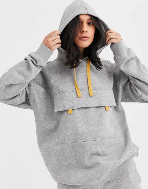 Mediar bofetada Corea Sudadera gris con capucha y bolsillo delantero de Monki | ASOS