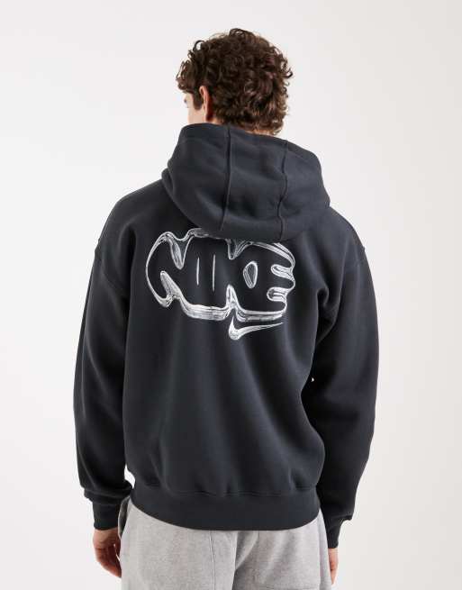 Sudadera gris con capucha y estampado tipo burbuja en la espalda de Nike