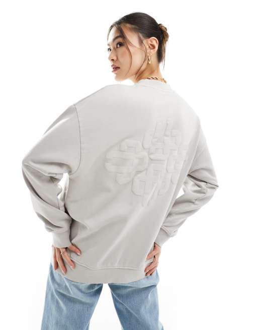 Sudadera gris con emblema y acabado lavado de Móvil y apps de FhyzicsShops