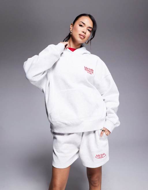 Sudadera gris extragrande con capucha y estampado 