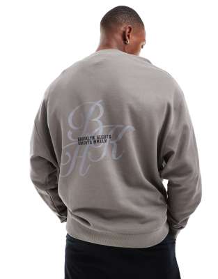 Sudadera gris extragrande con estampados de ASOS DESIGN