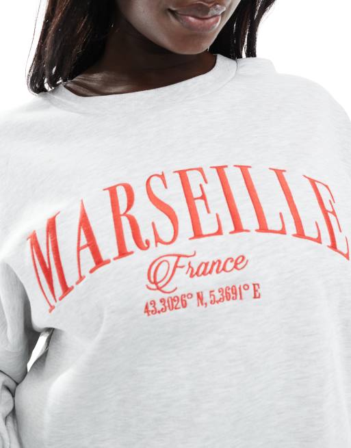 Sudadera gris hielo jaspeado extragrande con bordado gráfico "Marseille" de ASOS DESIGN Curve, 2 de 4