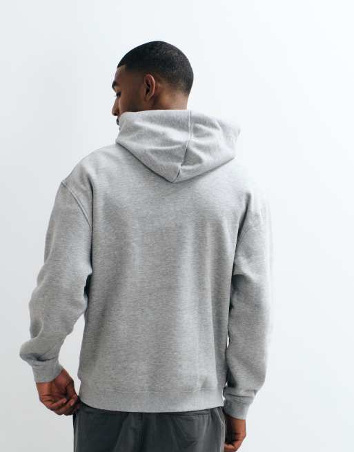 Sudadera gris jaspeado básica holgada con capucha de ASOS DESIGN, 4 de 5