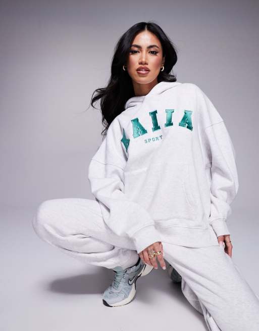 Sudadera gris jaspeado con capucha y logo bordado de Kaiia Sport (parte de un conjunto)