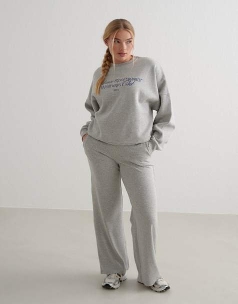 Sudadera gris jaspeado con estampado "Wellness" de Aim'n - view 1