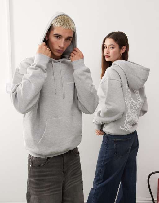 Sudadera gris melange unisex holgada con capucha y estampado gráfico en la espalda de símbolo de la paz e iniciales 