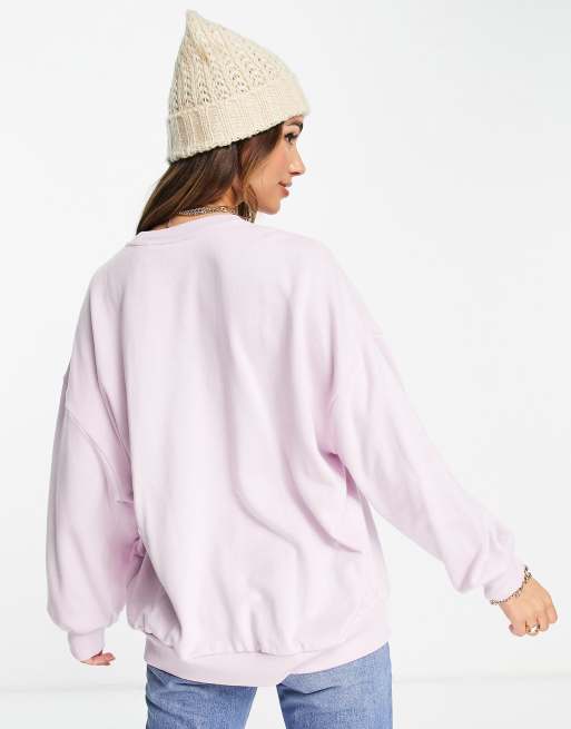 Sudadera lila con cuello redondo y estampado gráfico del logo de Levi's, 2 de 4
