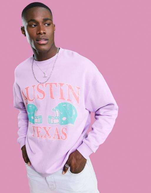 Sudadera lila extragrande con estampado de ciudad desgastado de ASOS DESIGN